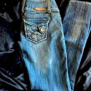 Distressed Almost Famous stretch skinny jeans